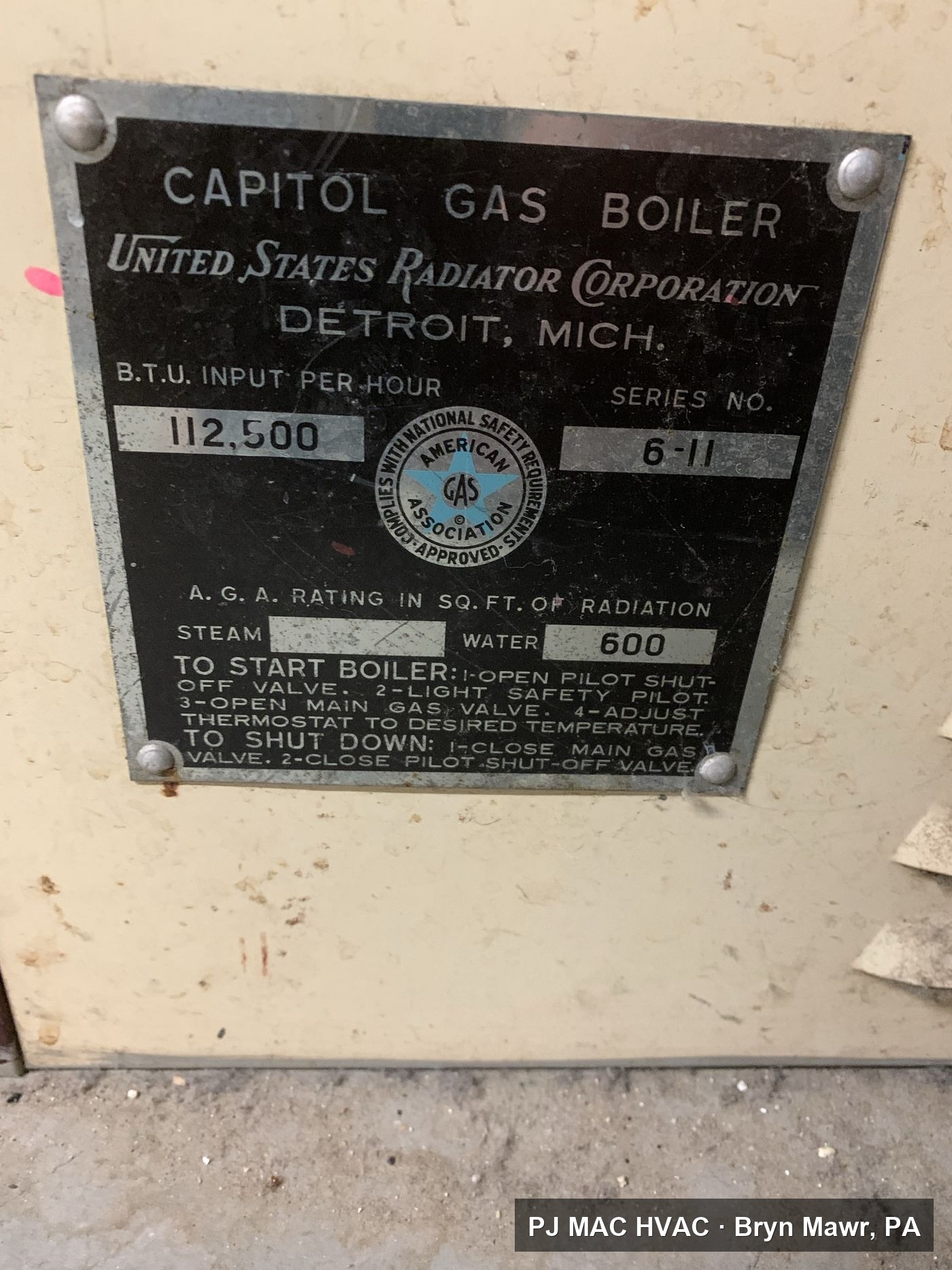 The nameplate of a vintage Capitol gas boiler that PJ MAC HVAC evaluated for replacement.